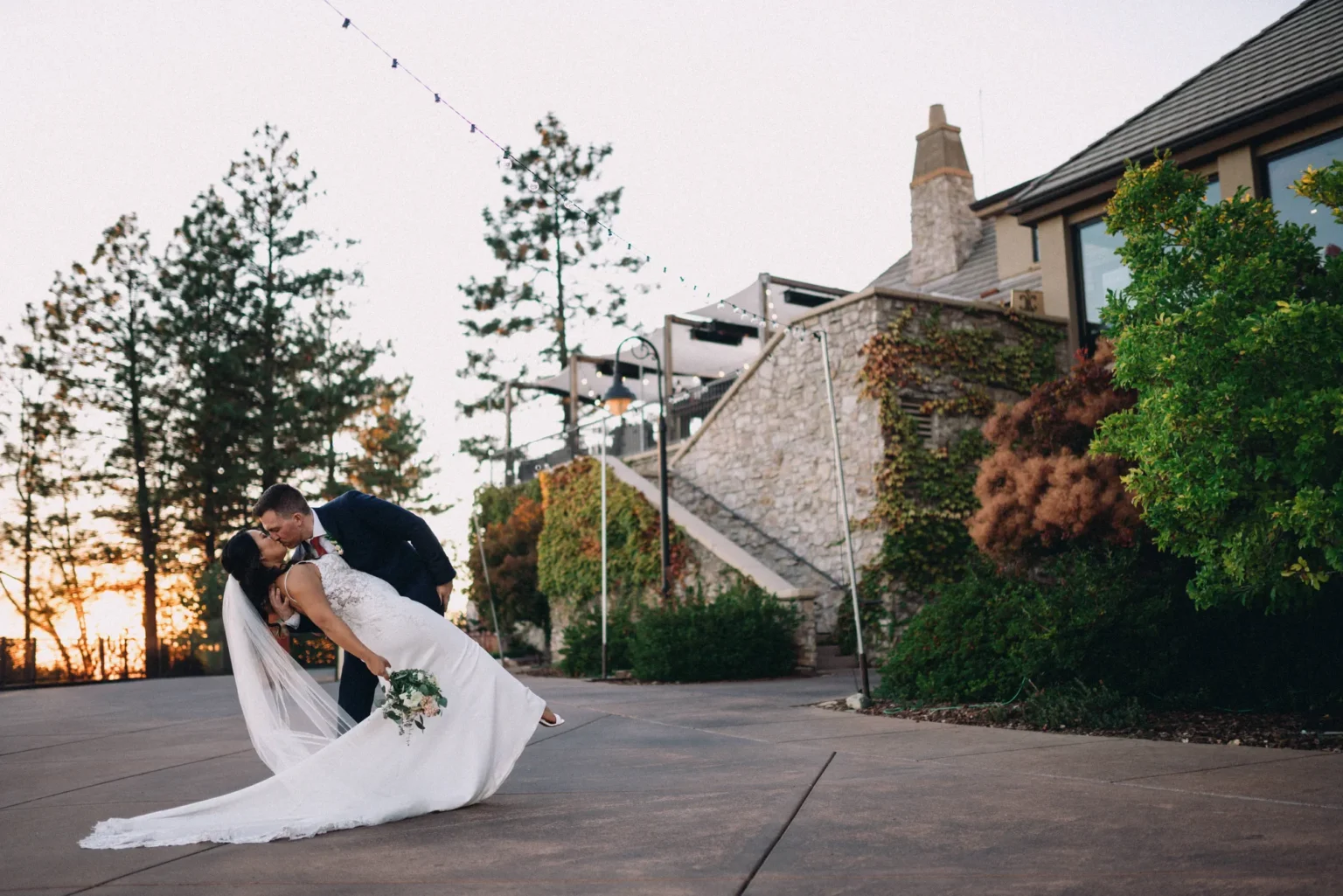 couple kissing during golden hour at Winchester Estates